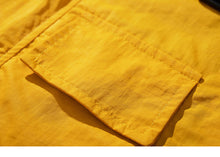 Load image into Gallery viewer, Vintage yellow patch style Hooded Windbreaker
